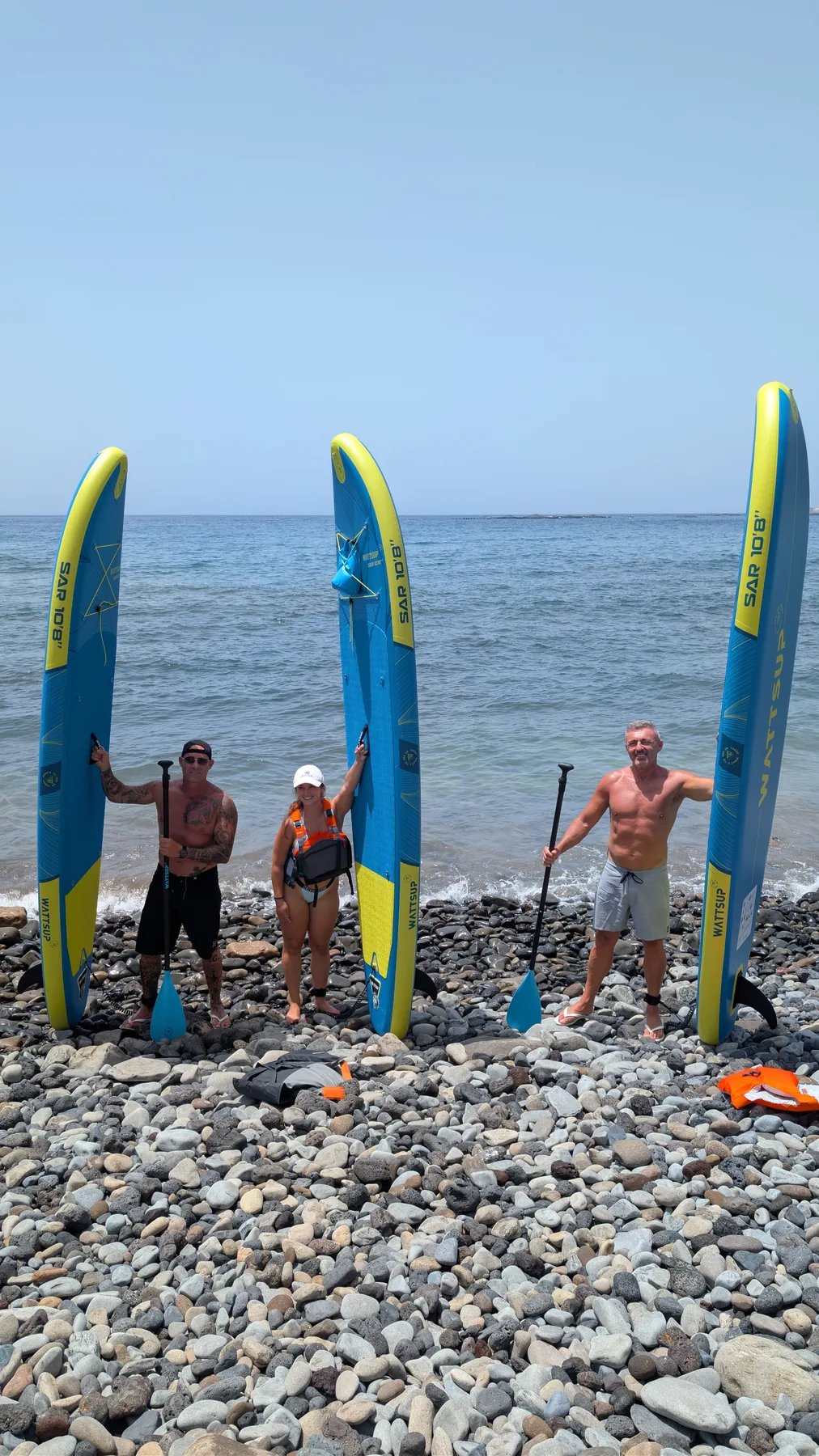 Tablas de paddle surf en la costa