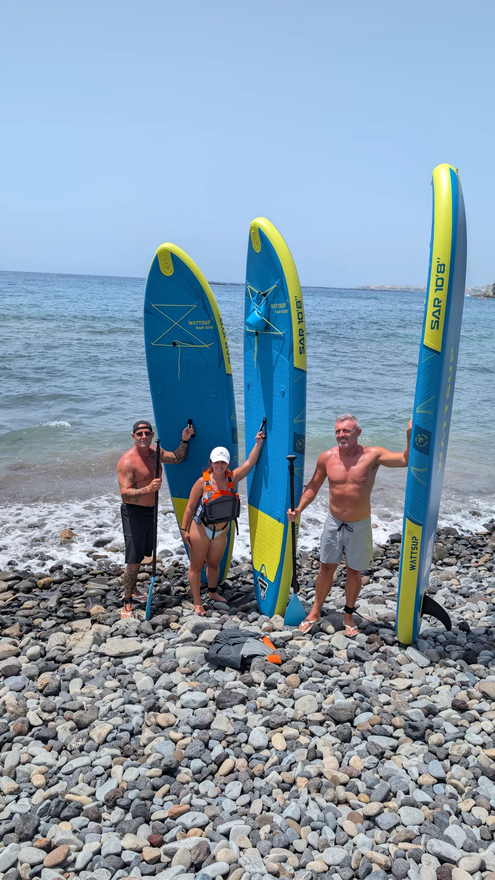Actividad de paddle surf en la playa